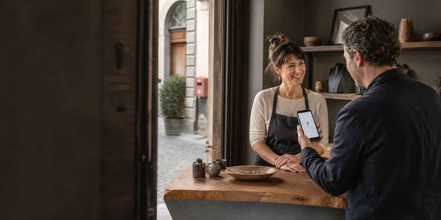 Customer arriving at a local shop after finding the business on a phone map